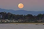 full moon over nsw coast and town