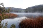 dunes swamp lake and mist at wollemi national park nsw australia
