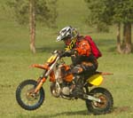boy riding motorcycle