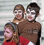 children with painted faces