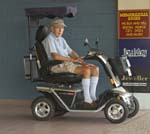 elderly mman on mobility scooter