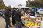 people shopping at vegetable stall at country farmers market at Murrabit victoria australia