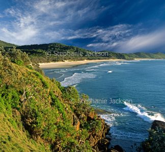 View of bay and sandy beach at Grassy Head, NSW, Australia